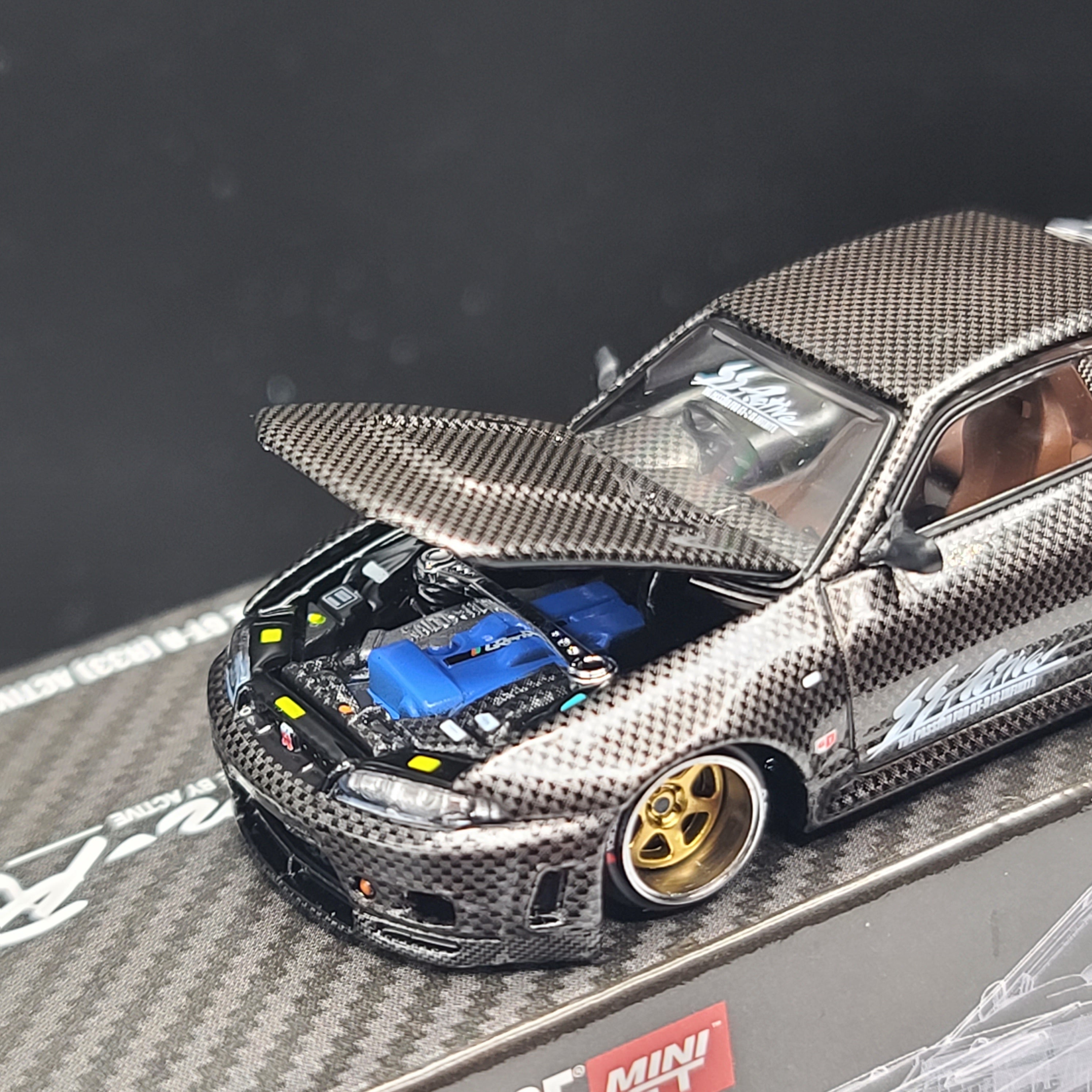 Kaido House x Mini GT Nissan Skyline GT-R (R33) Active Carbon R V1 - 1:64 (2024 Limited Edition)